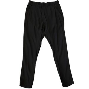 Scanlan Theodore silk black ankle tapered pants. Stretch waist.Pockets. Size 6.